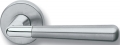 Pair of Ghidini Lever Handles Ginevra Inox with Roses and Escutcheons