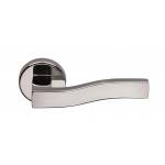 Pair of Ghidini Lever Handles Q-Urva ZCL with Roses and Escutcheons